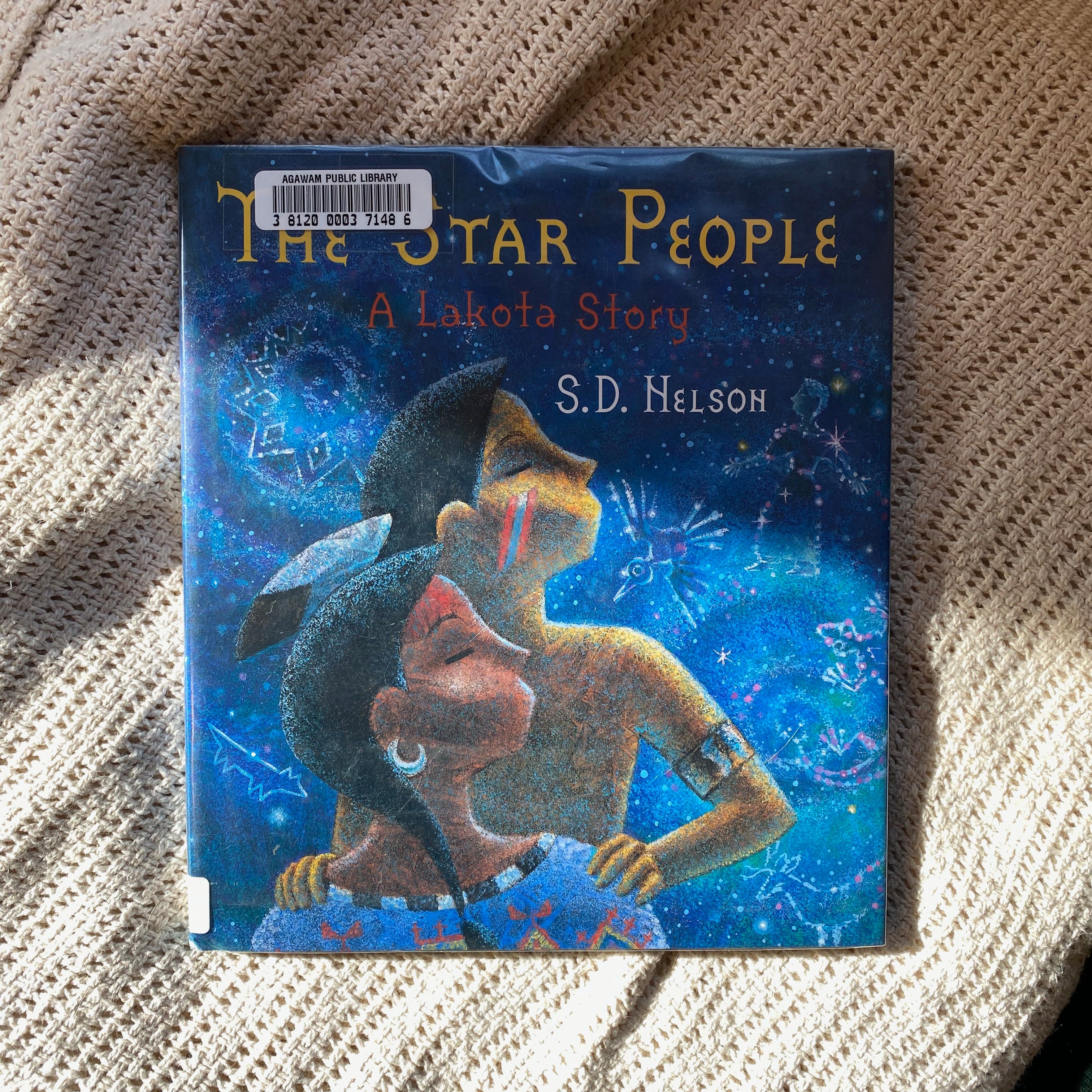 The Star People on a white blanket.